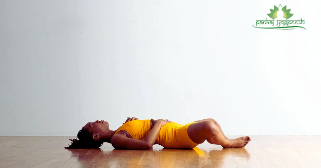 Supta Baddha Konasana (Reclining Bound Angle Pose)
